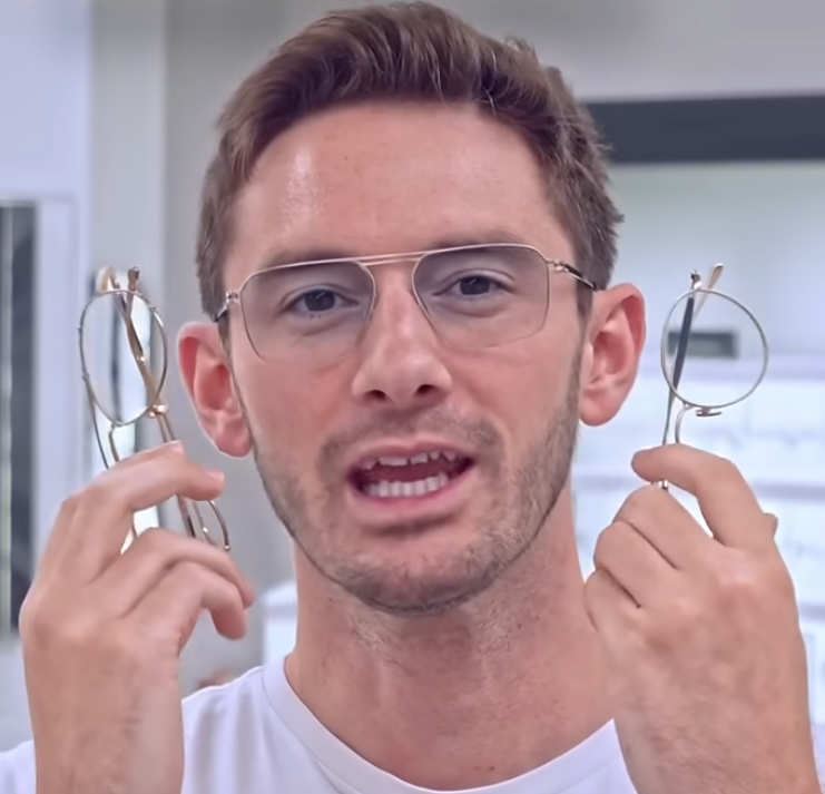 Rob holding glasses